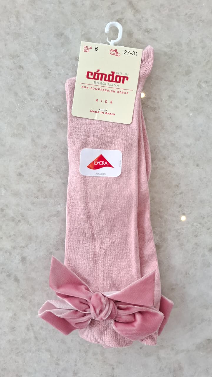 Calcetines altos punto liso con lazo de terciopelo