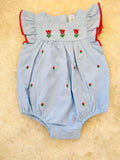 Light blue romper or jumpsuit with red flower embroidery
