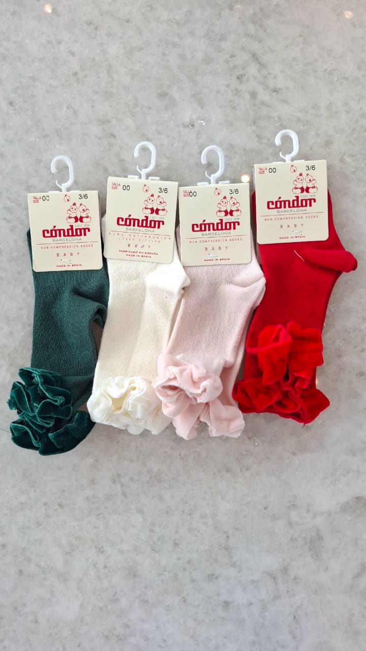 Calcetines altos cinta terciopelo fruncida en puño