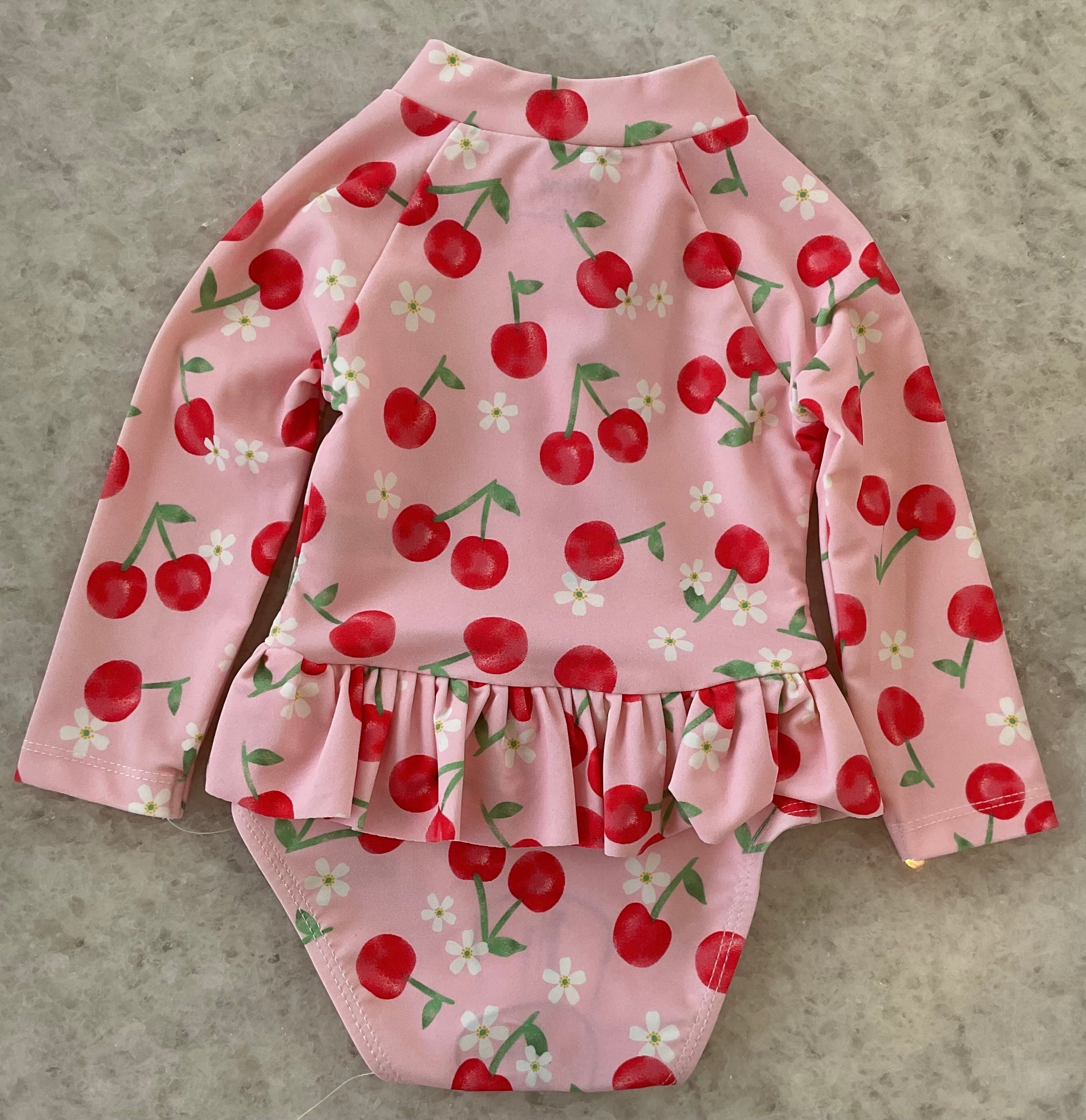 Cherry and strawberry print swimsuit with matching cap
