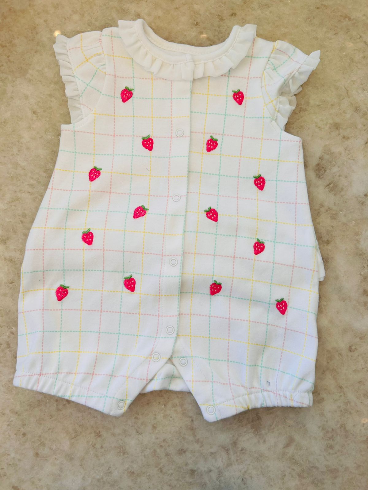 Romper embroidered strawberry design and snap closure