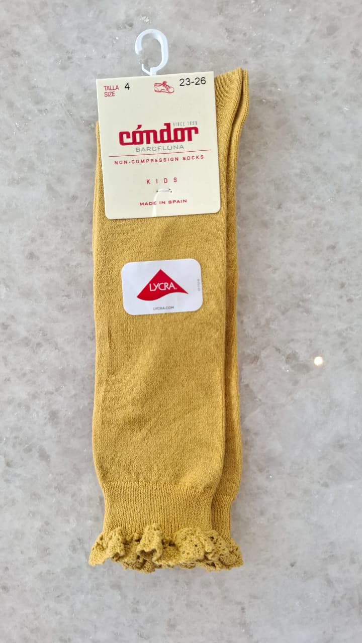 Calcetines altos punto liso con puntilla en puño