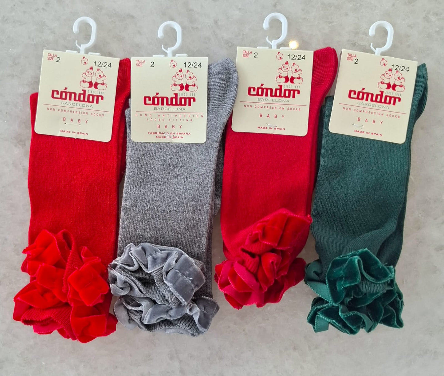 Calcetines altos cinta terciopelo fruncida en puño