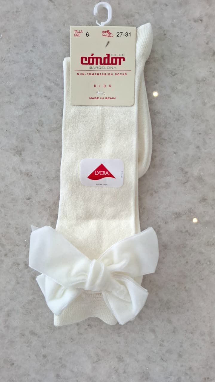 Calcetines altos punto liso con lazo de terciopelo