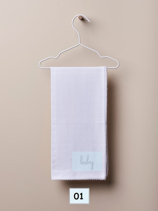 Cotton swaddle with the word “baby”